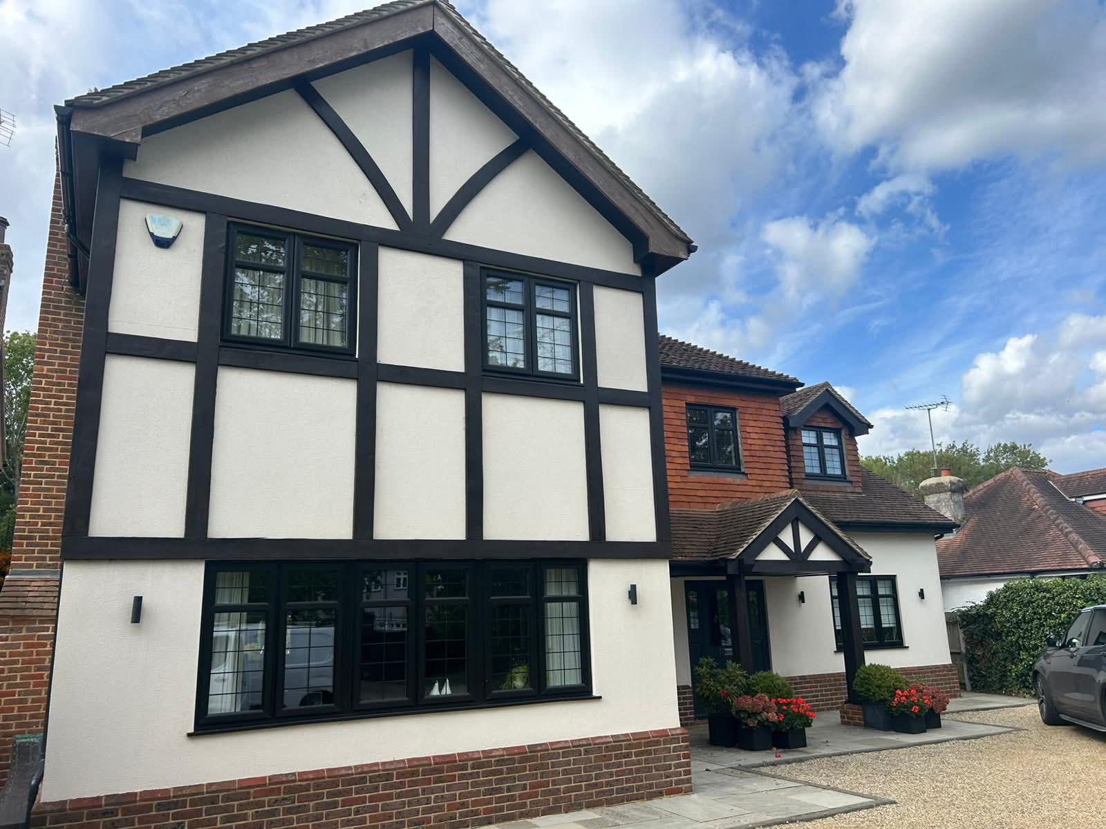 Exterior decorating on a Tudor-style home in Surrey